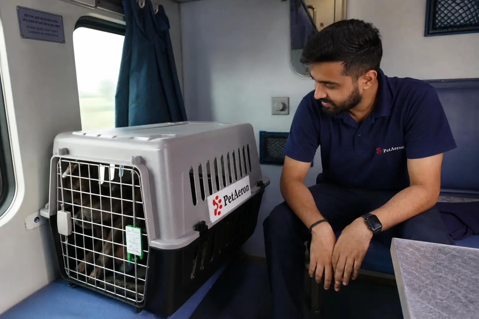 Pet and IATA crate on Indian Railways First AC train feeder to departure hub for Izmir flight